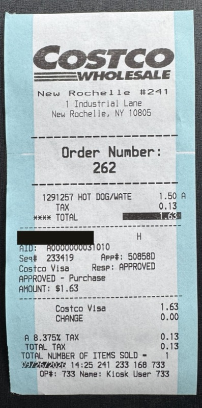 The food court receipt, with the card number blacked out.