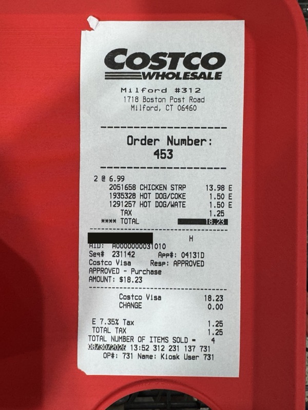 The food court receipt, with the card number blacked out.