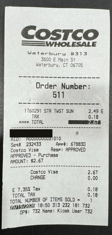 The food court receipt, with the card number blacked out.