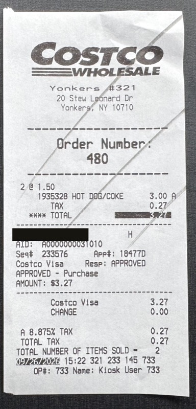 The food court receipt, with the card number blacked out.