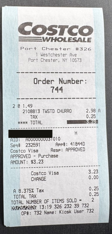 The food court receipt, with the card number blacked out.