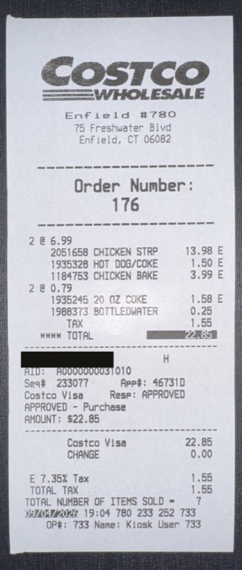 The food court receipt, with the card number blacked out.